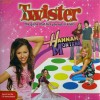 Joc Twister - Hannah Montana sau Lazy Town - Dimensiuni suprafata de joc: 166x140 cm. Dimensiuni cutie: 27x27x5 cm.