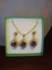 Set placat cu aur de 18k, format din colier si cercei cu cristale ametist round cut si cristale swarovski clear de 2 mm