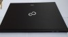 Caiet studentesc in forma de laptop Fujitsu, paginile sunt cu patratele, coperti cartonate