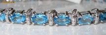 Bratara aur alb ornata cu 12.6ct TOPAZE si DIAMANTE foto