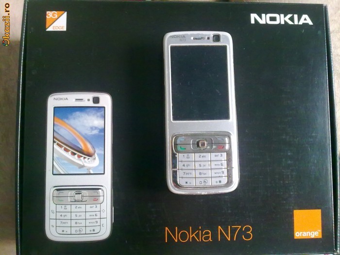 Nokia N73 cu  accesorii + card 2 GB foto mare